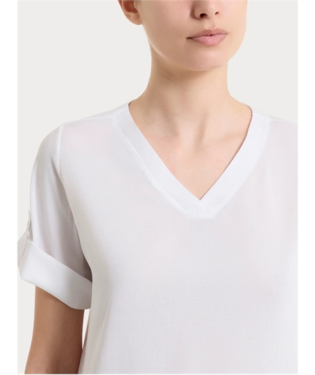 Ragno DS23SJ - Blusa con scollo a V e manica corta risvoltabile in Voile Stretc. Colore: Bianco 010