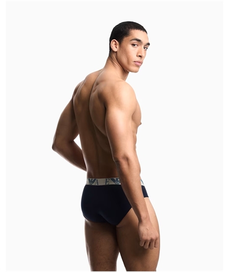 EM000258AF25018 Set di 3 Slip Emporio Armani in cotone elasticizzato. Colore: Bleu MB139